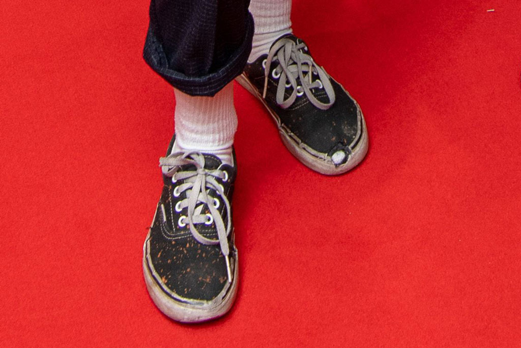 Stewart's shoes look stinky and torn