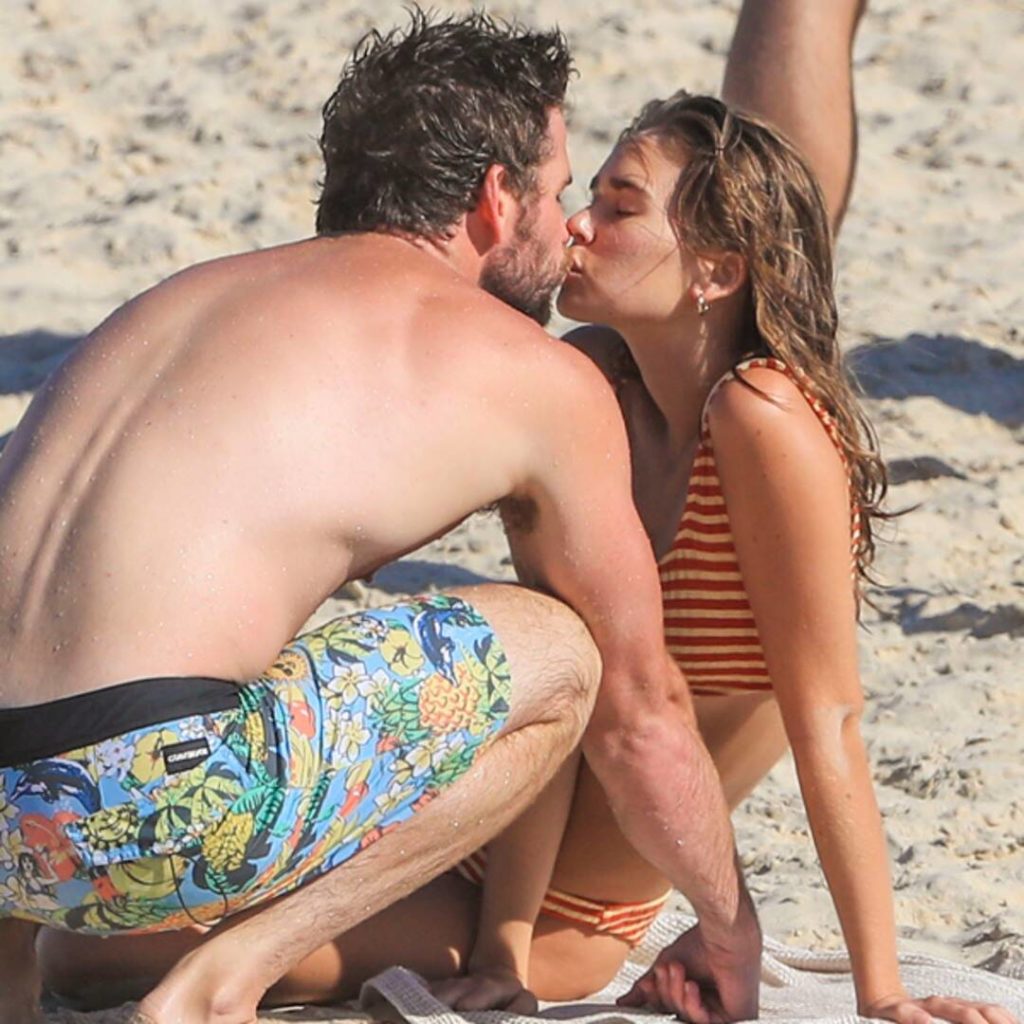 Liam Hemsworth kissing Gabby on beach New Idea