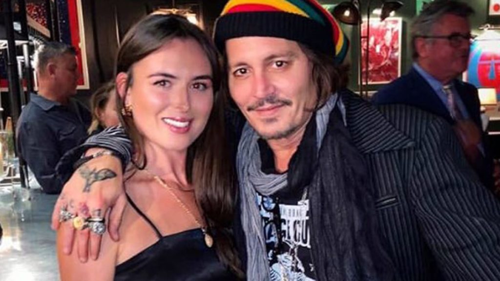 Johnny Depp enjoys a pint with fans at local London pub after trial