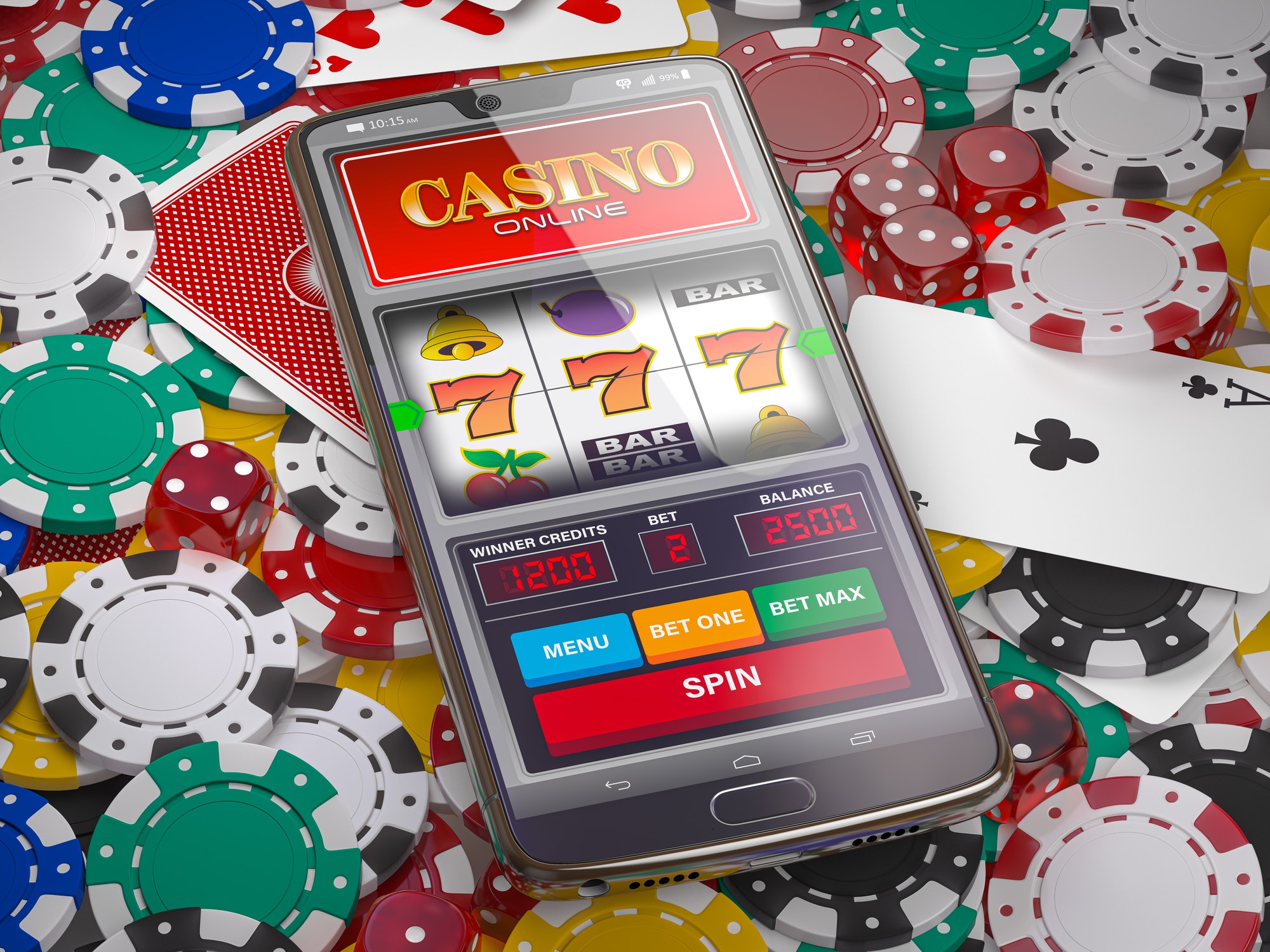 Online casino. Slot machine on smartphone screen, dice, casino chips and cards.