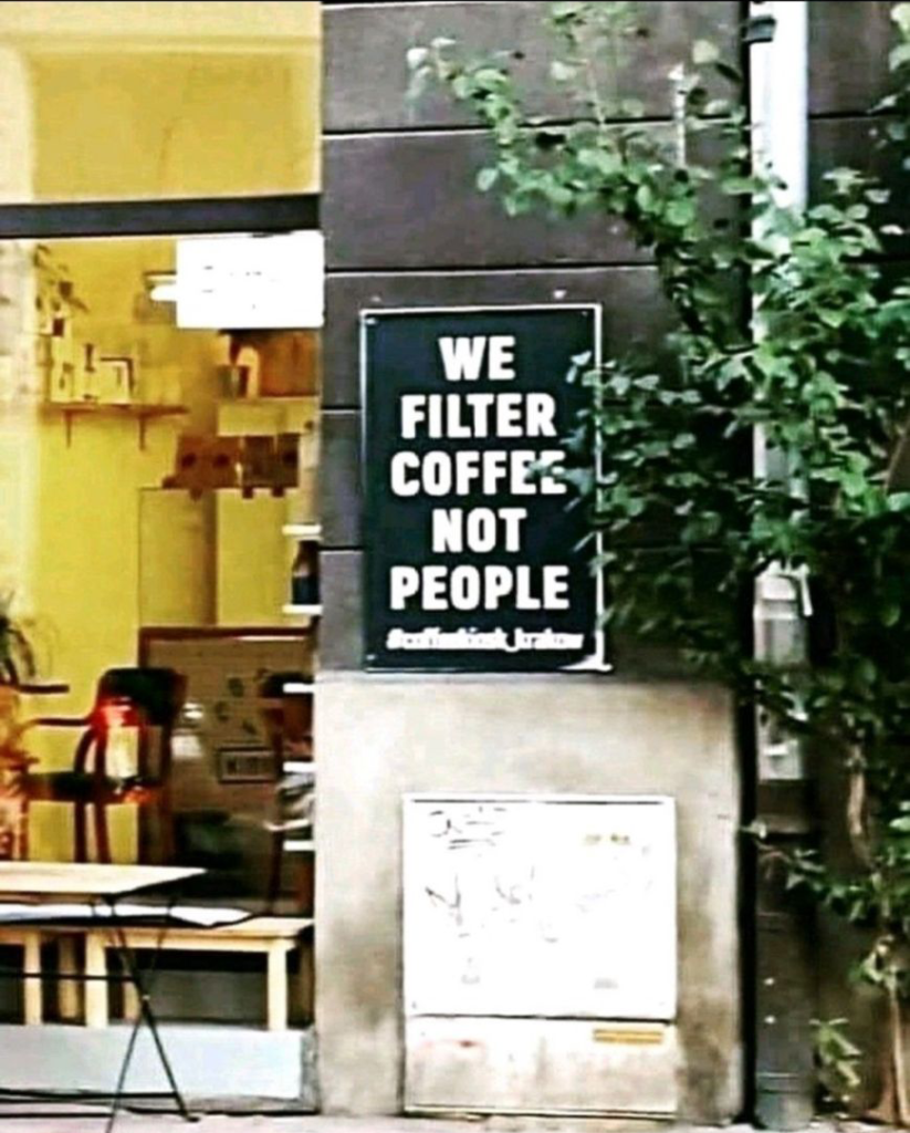 "We filter coffee not people." Sign outside The Coffee Commune in Bowen Hills, Brisbane.
