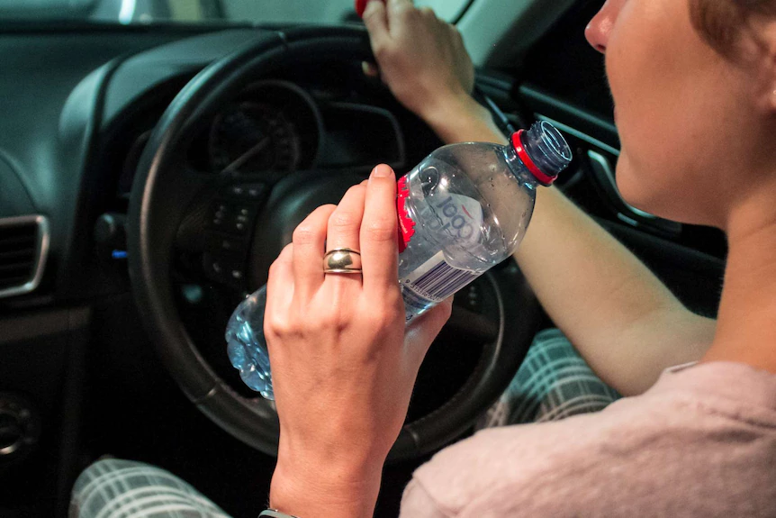 Man fined for drinking water while driving in Australia.