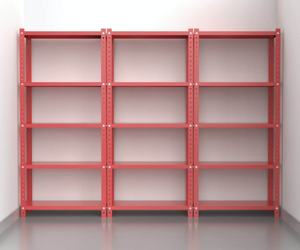Warehouse with empty metal shelving units