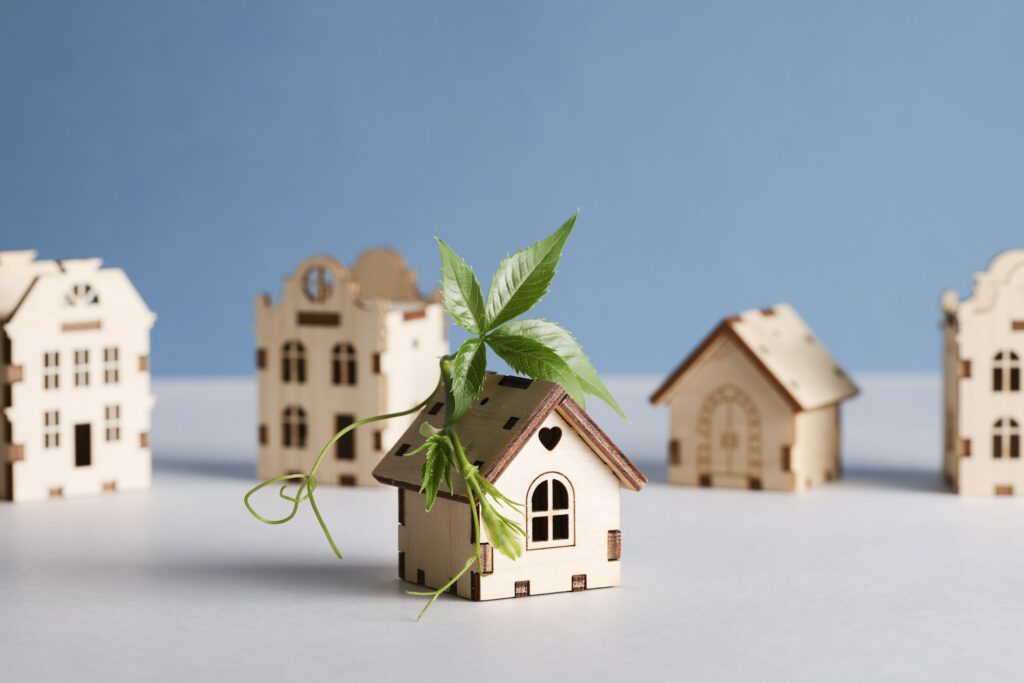 retrofit movement, future proofing homes, net zero carbon, adapting buildings concept. toy houses