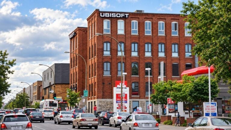 The Ubisoft Montreal office building on a city street.